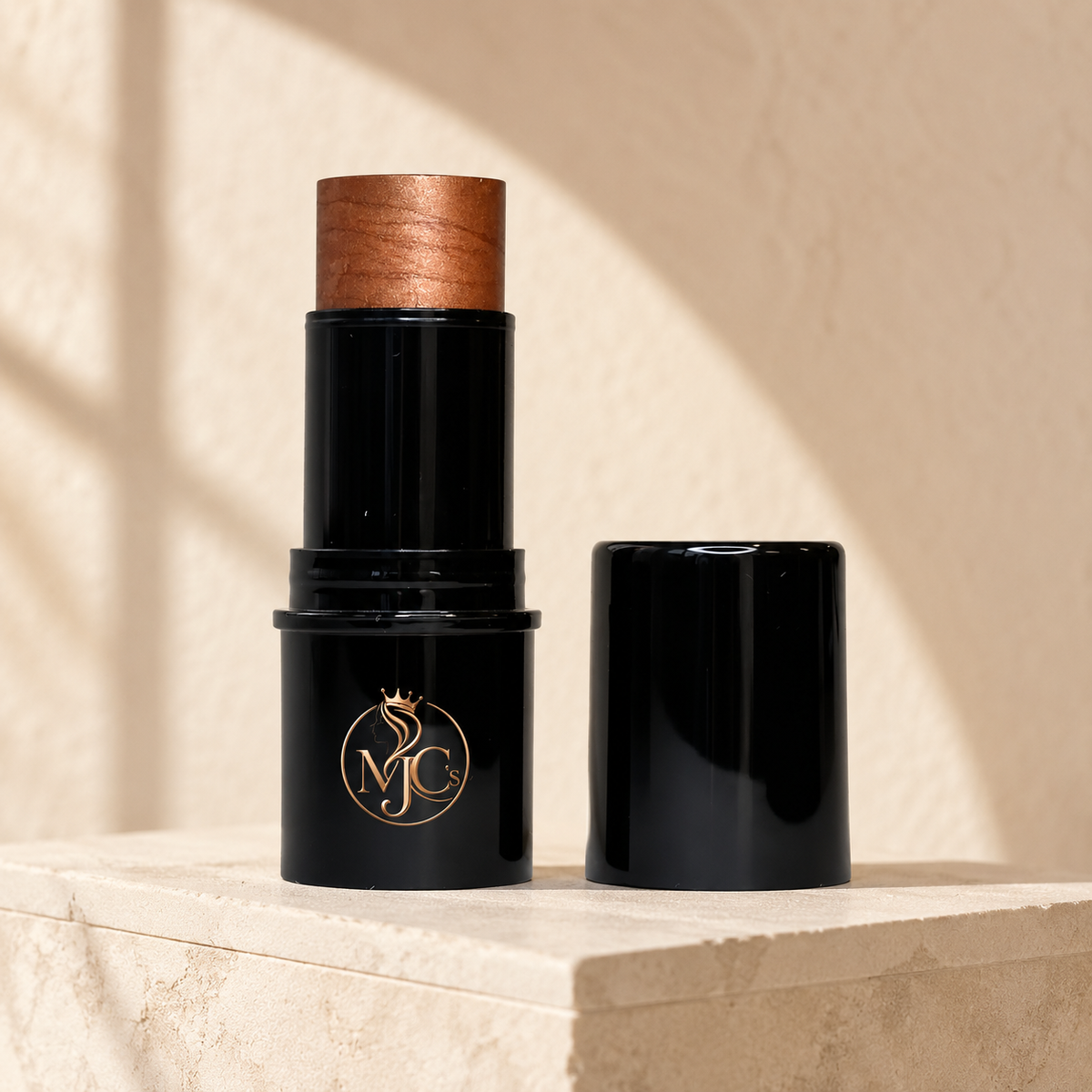 MJC'S luminous Bronze Lights highlighter applied to face